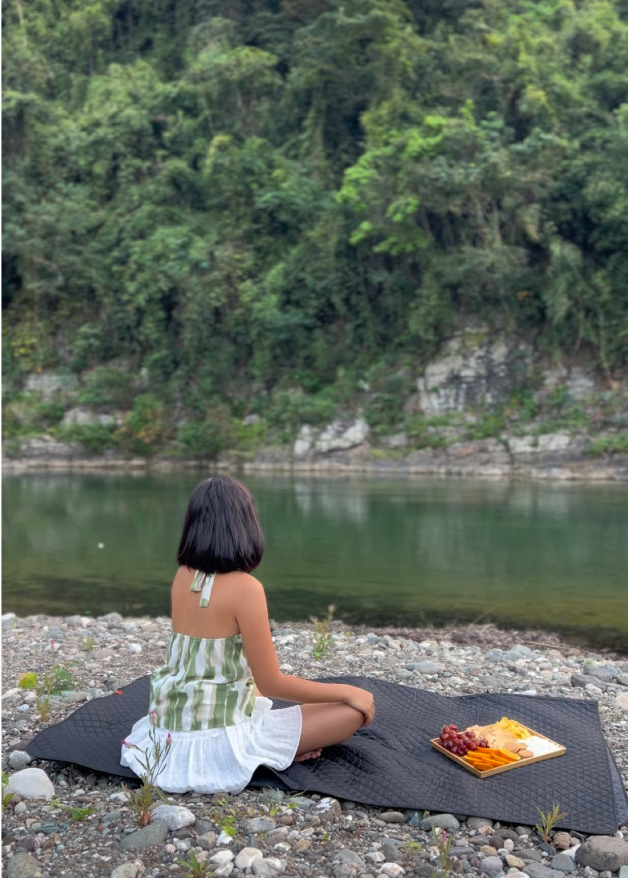 Relaxing by the river at Muni Land